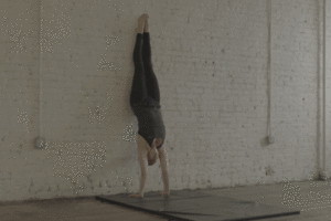 Handstand straddle down wall